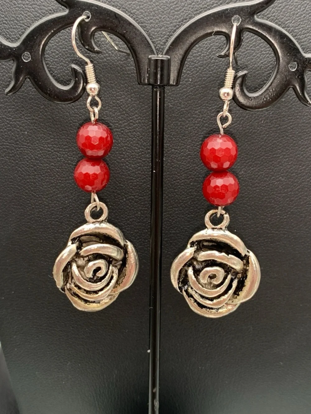 Antiqued silver tone Rose earrings with dark red faceted beads